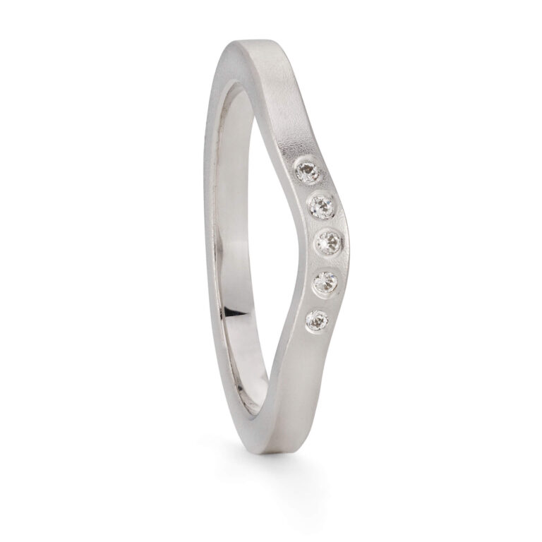 Platinum curved wedding ring with diamonds designed by Jacks Turner Bristol jeweller