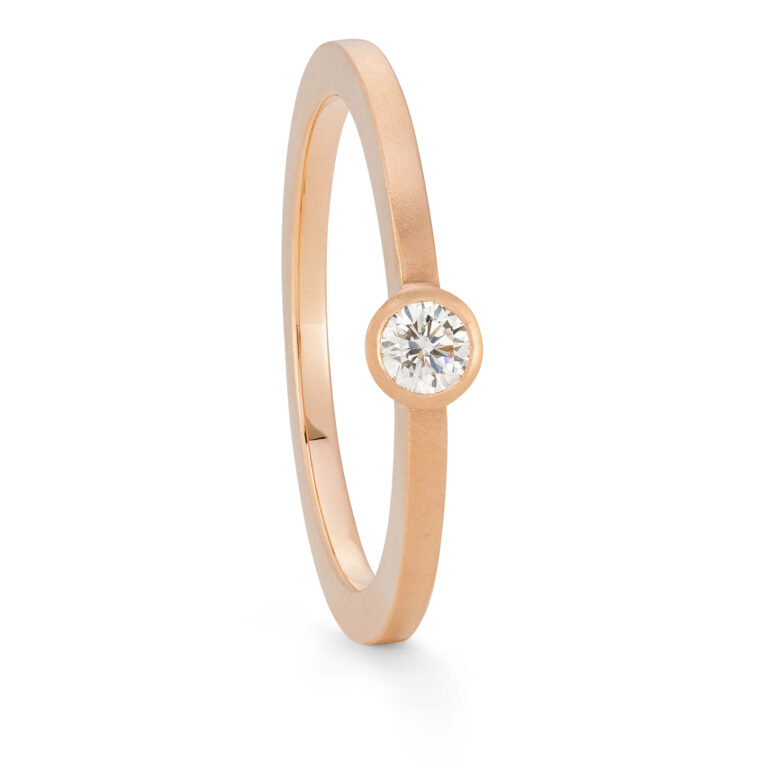 Thin rose gold diamond ring. Engagement rings designed by Jacks Turner in her Bristol jewellery workshop.