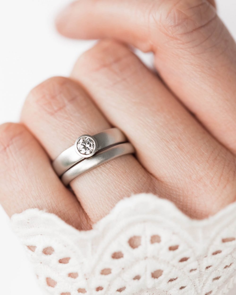 Grand Diamond Engagement Ring With Wedding Band On Finger Jacks Turner Bristol