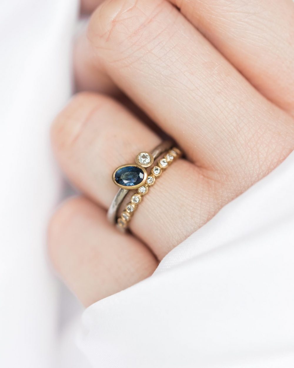 Oval Sapphire And Diamond Contemporary Engagement Ring. Handmade By British Jewellery Designer Jacks Turner.