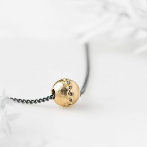 Diamond eternity necklace handmade by contemporary jewellery designer Jacks Turner.