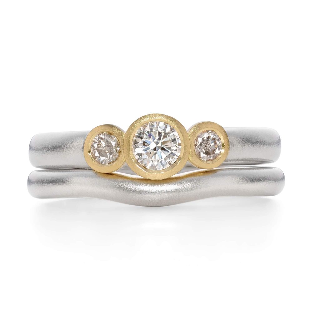 Diamond Trio Engagement Ring Handmade In Platinum With 18Ct Yellow Gold Settings. Pictured With A Platinum Curved Wedding Ring. Designed By Bristol Jeweller Jacks Turner.