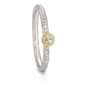 Solitaire rosecut diamond pave ring, handmade with a textured hammered platinum band with a yellow gold setting. Designed by Bristol jeweller Jacks Turner.