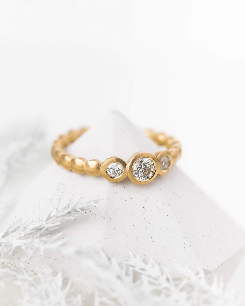 Trio Diamond Engagement Ring Pictured In Yellow Gold, Designed By Jacks Turner In Bristol.