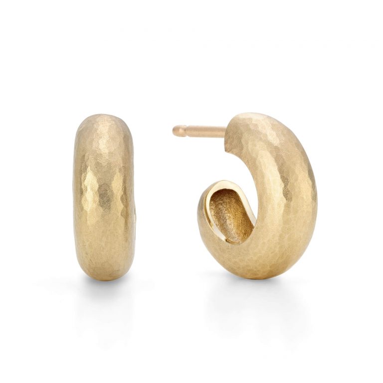 Gold huggie hoops with a hammered finish. Nine carat gold contemporary earrings made by jewellery designer Jacks Turner.