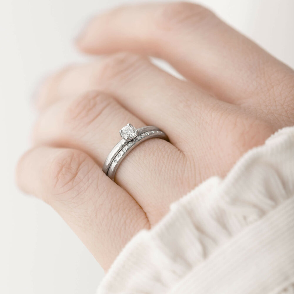 Geo Claw Diamond Ring With Platinum Wedding Ring On Model Jacks Turner Bristol Jeweller