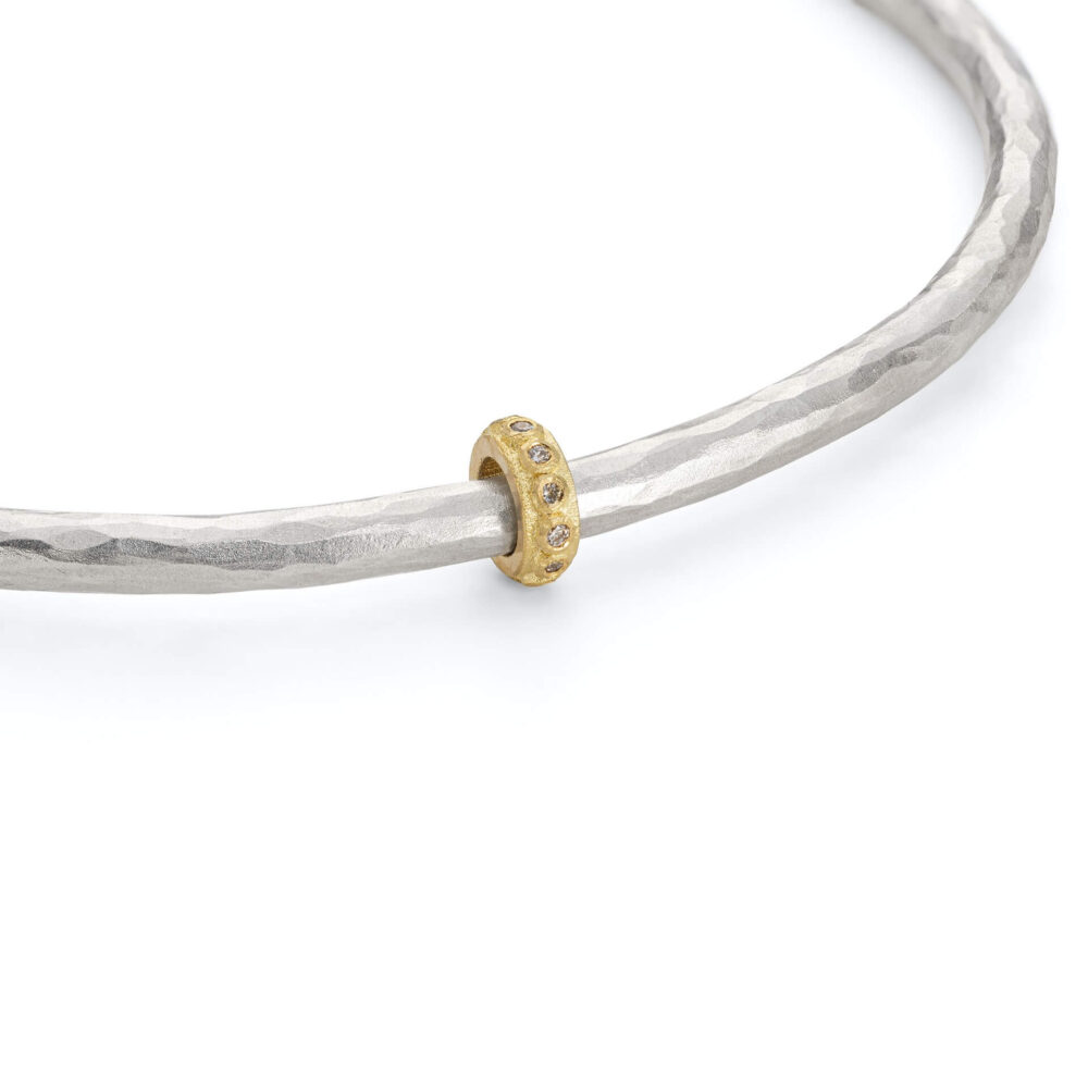 Eternity Silver Bangle With Gold Diamond Bead. Designed By Jacks Turner Contemporary Jewellery Bristol.