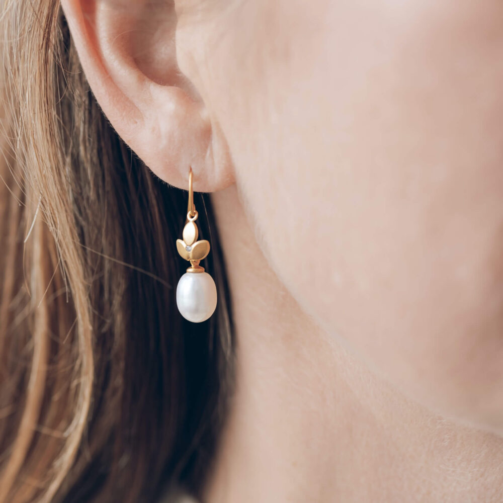 Eve Diamond Pearl Drop Earrings On Model. Designed And Handmade By Jacks Turner Bristol.